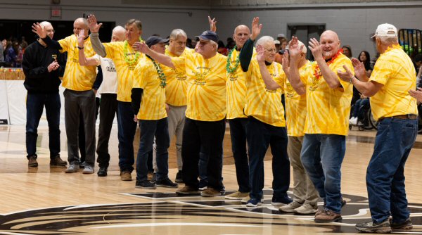 2026-01-24-72-73-team-at-basketball-game.jpg