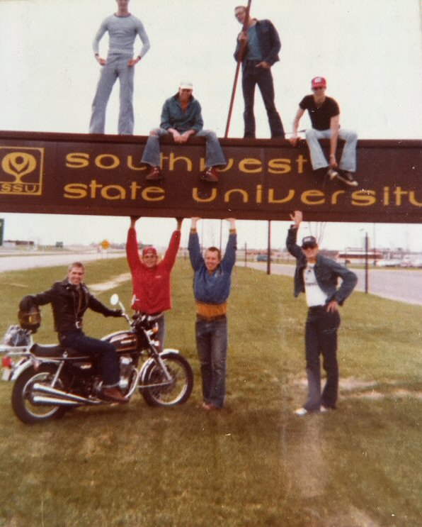 Team-members-by-school-sign-small.jpg